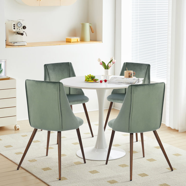 Dining table and discount 4 velvet chairs